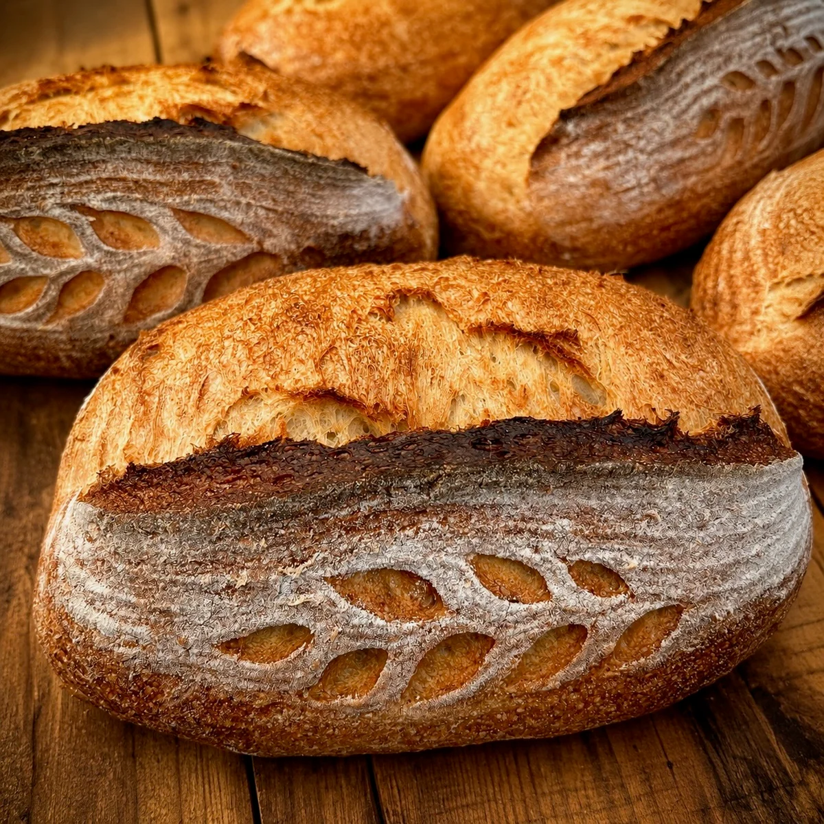 A selection of artisan sourdough loaves baked at Wedges Bakery